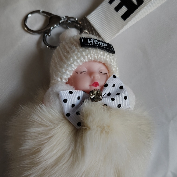 no brand Other - Cream Plush Sleeping Baby Keychain with Polka Dot Bow (New)